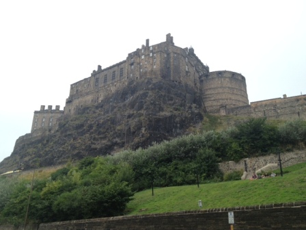 Castle Rock from the western side near Princes Street Gardens. See, it's "looming".