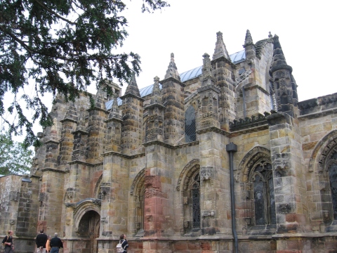 A complete view of the side of the chapel. The colors on the exterior are the true sandstone colors--red, yellow, and orange. The inside is coated in concrete, making it erroneously gray.